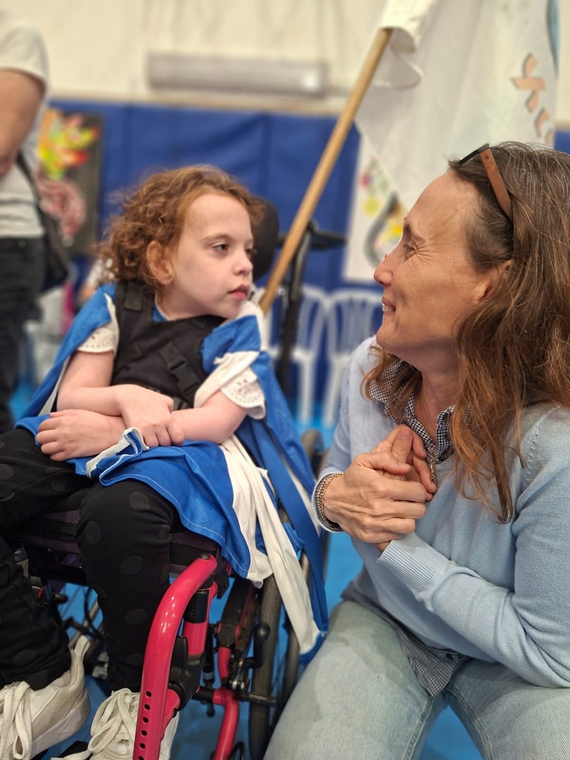 A tender moment between a teacher and student